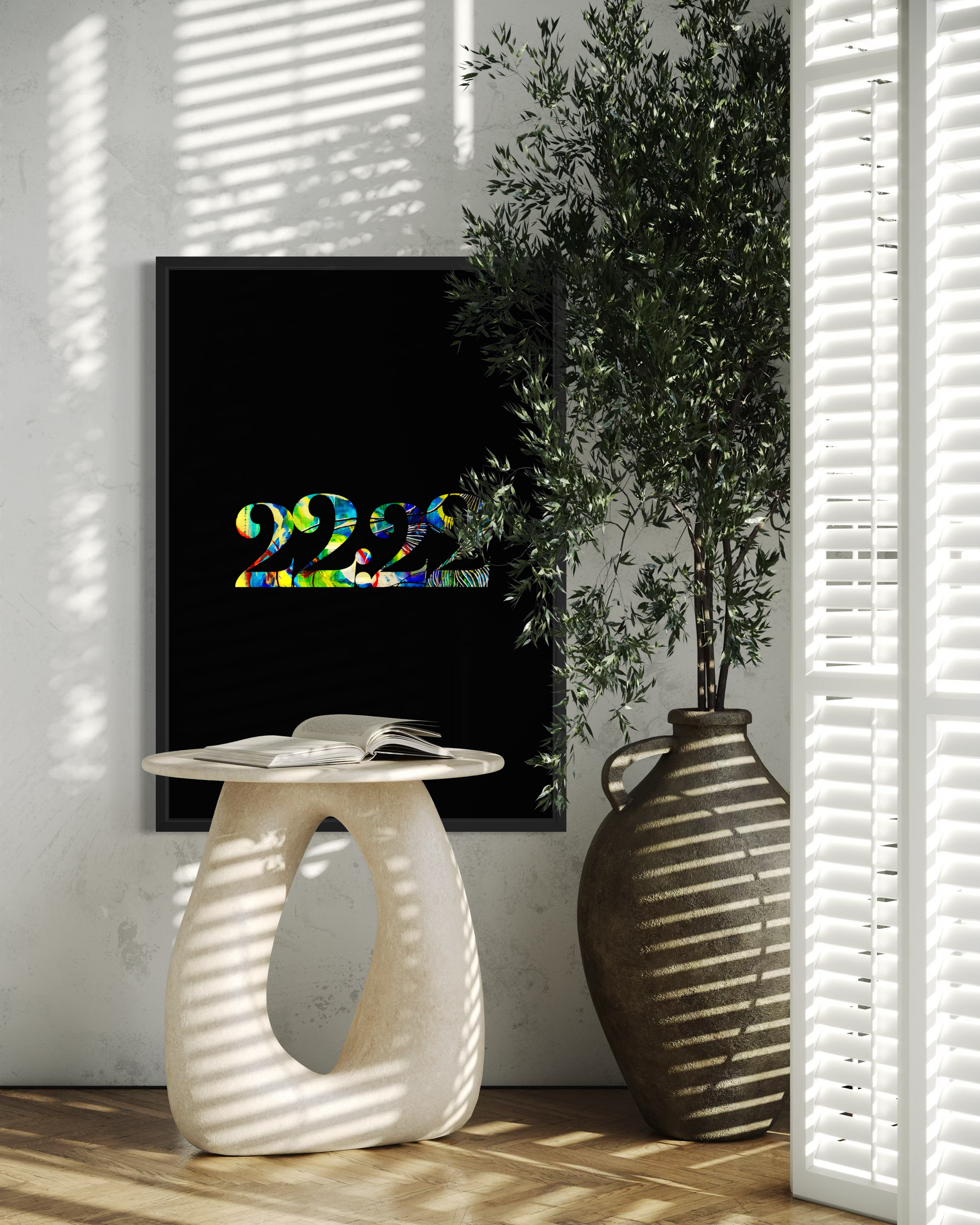 A framed wall art print featuring the year '2025' in a colorful, textured font on a black background, styled in a modern interior next to a white side table and a large brown vase with a potted plant.
