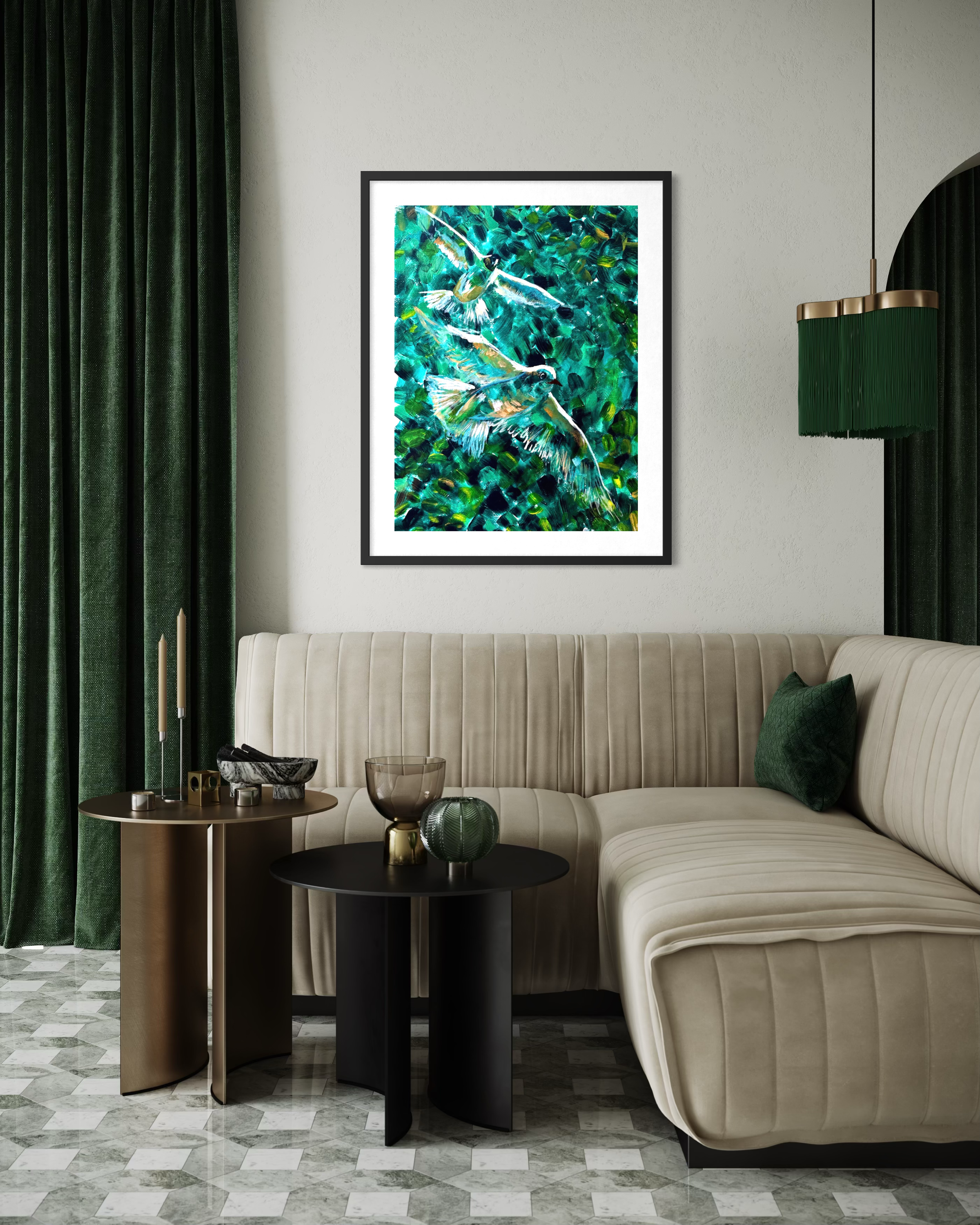A framed abstract art print featuring teal, green, and blue brushstrokes with white bird silhouettes, displayed on a light gray wall above a beige sectional sofa in a modern living room setting.